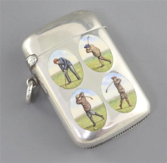 A late Victorian silver and enamel vesta case with four oval golf related panels, George Heath, London, 1898, 55mm.
